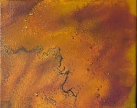 an abstract painting with orange and brown colors