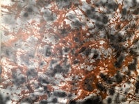 an image of a painting with orange and black splatters